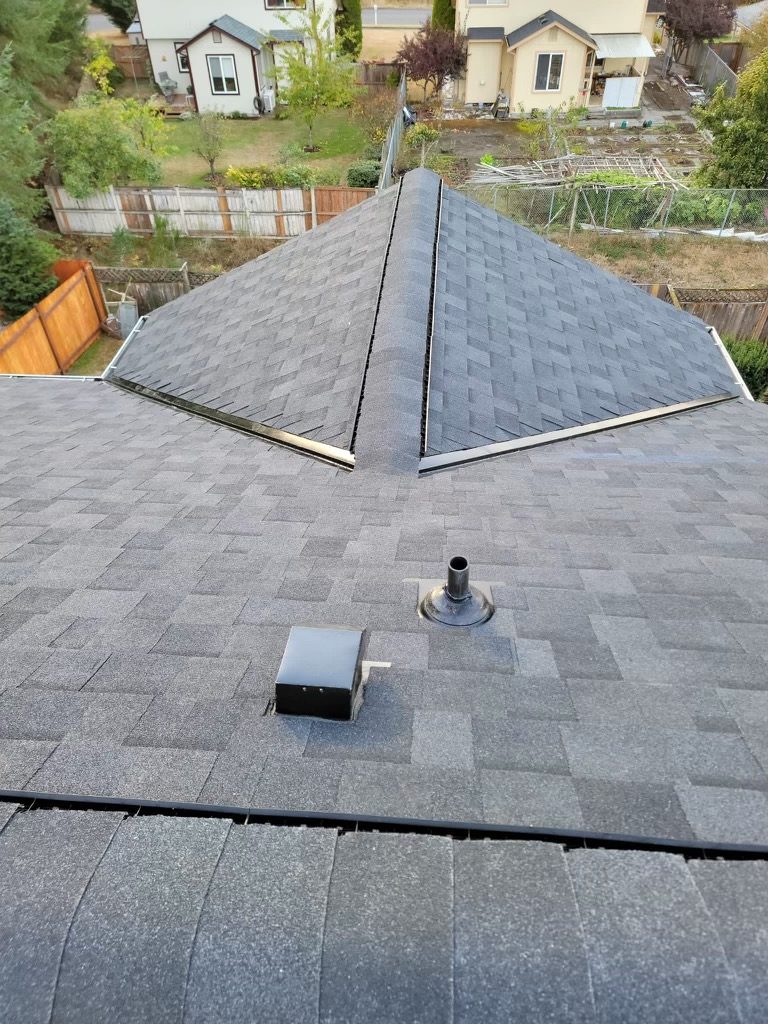 Completed hip roof with architectural shingles